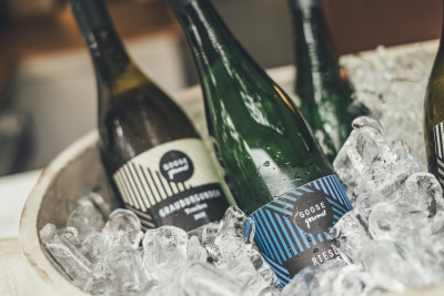 GOOSE Gourmet wine bottles in a bucket full of ice at event venue Frankfurt GOOSE Eventspace
